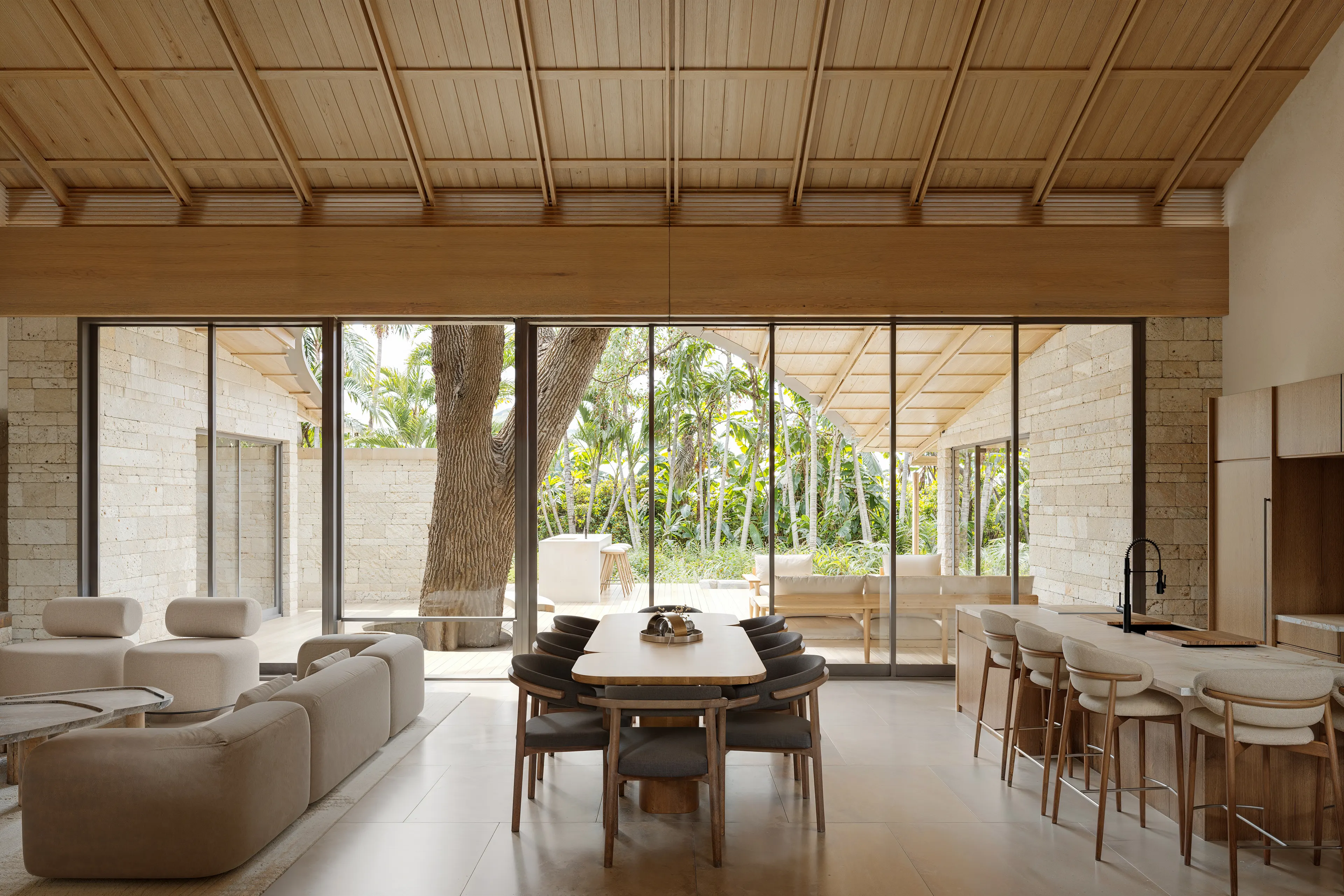 Moving through, the interior opening to the trees